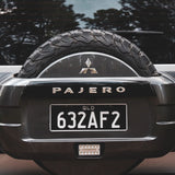 Front view of Mitsubishi Pajero chrome spare wheel sticker, highlighting its sleek design. Also showcases spare wheel light.