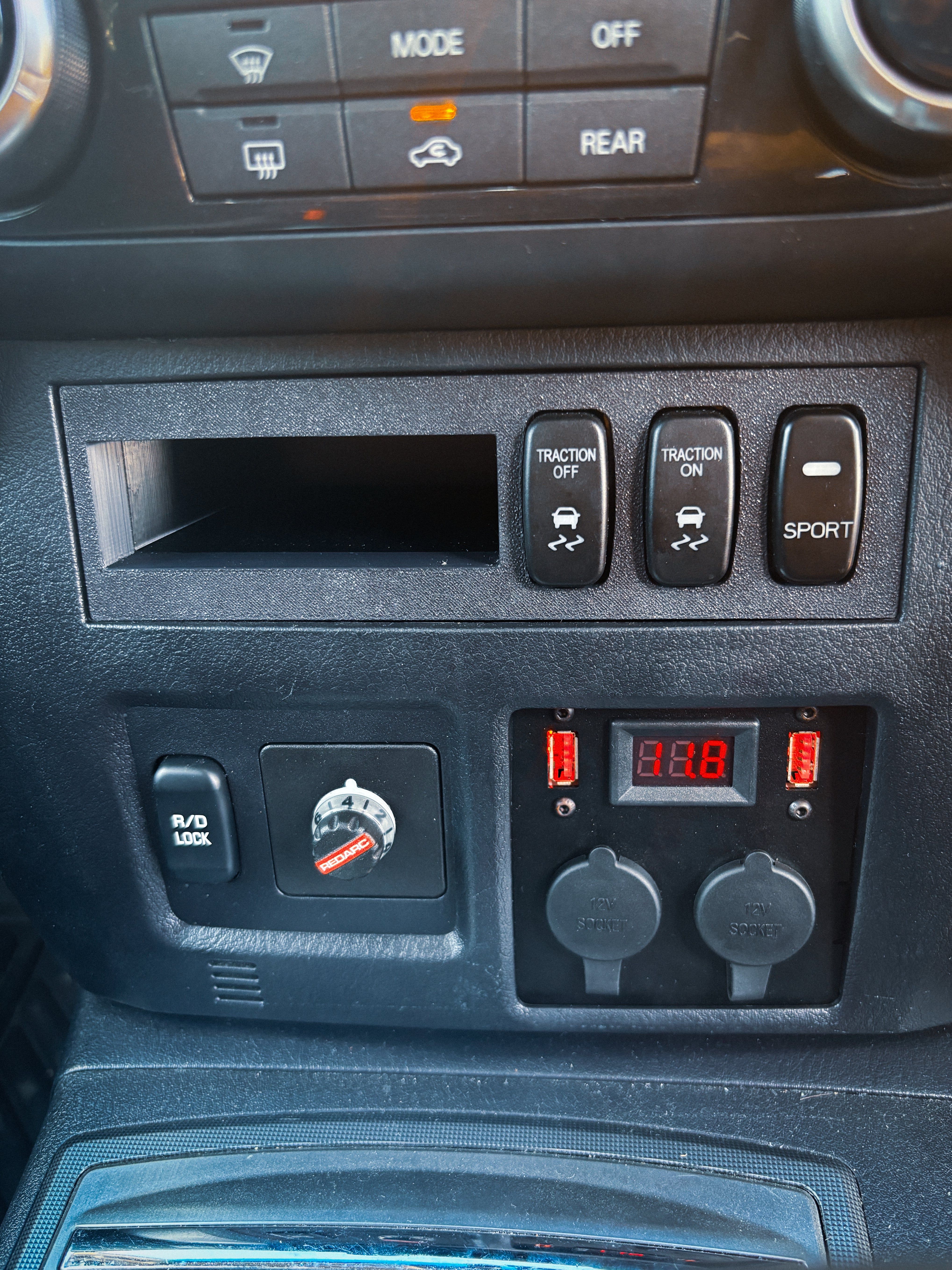 Factory Switch x3 & Phone Pocket Panel for Mitsubishi Pajero NS, NT, NW, NX (2006–2021)